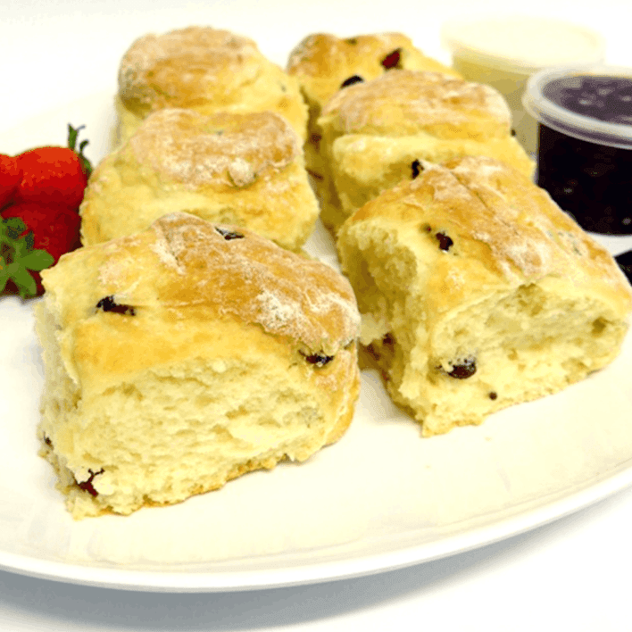 Scone (Whole) - Date and Fruit with tubs of house-made jam and cream
