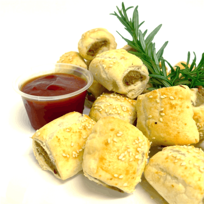 Mini sausage roll served with tomato sauce