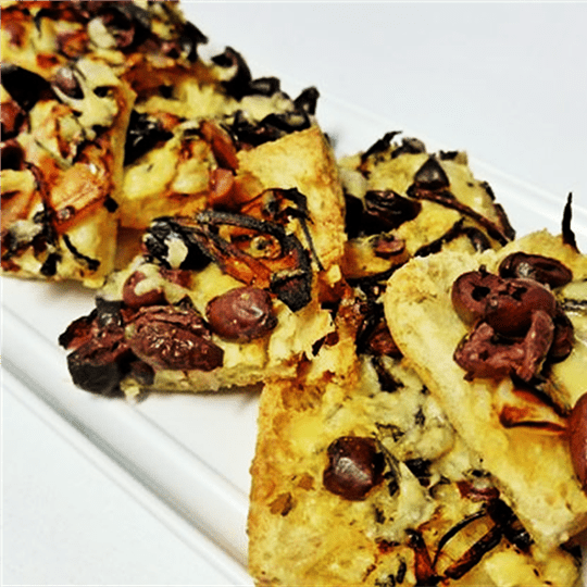 Turkish Pizza Slices with Garlic Butter, Spanish Onion, sliced olives and Pecorino (V)