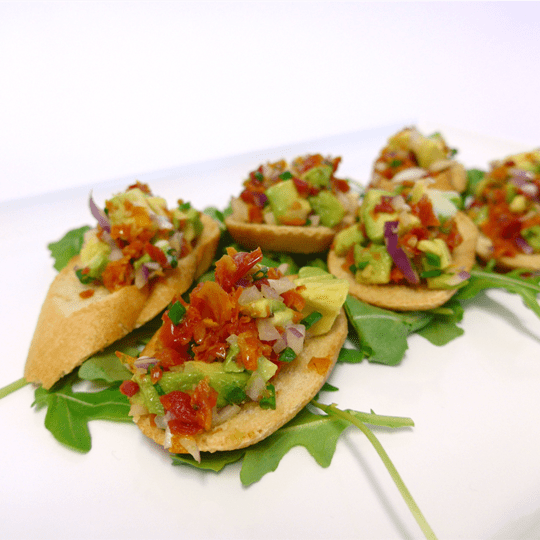 Bruschetta with semi dried tomato and pesto avocado (V)