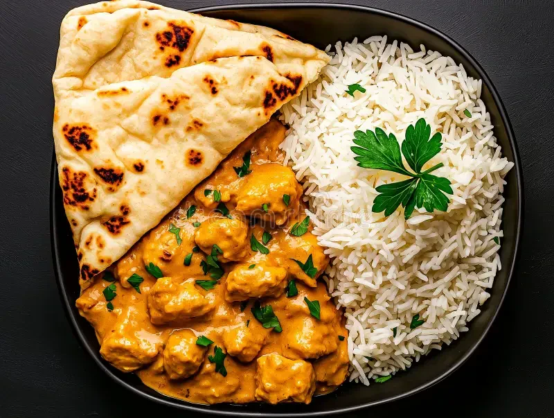 Rich butter chicken w/ aromatic rice