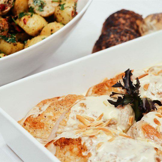 Buffet - Chicken Fillet stuffed with Brie Cheese & Almonds in a light Mustard Cream Sauce