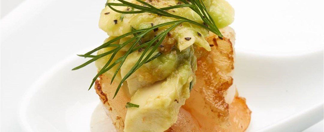 Seared Prawn Tail on a spoon with spicy guacamole GF