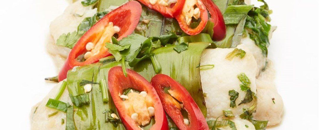 Steamed market fish in banana leaf GF