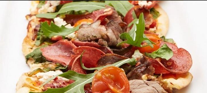 Pepperoni, spicy beef, fetta, baby spinach & cherry tomato pizza