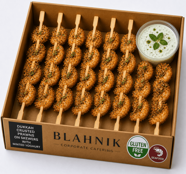 Dukkah crusted prawns on skewers with minted yoghurt