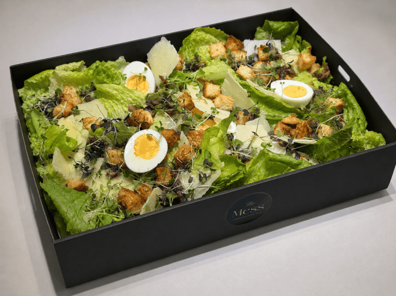 Caesar salad, cos lettuce, crispy bacon, eggs, garlic croutons, caesar dressing