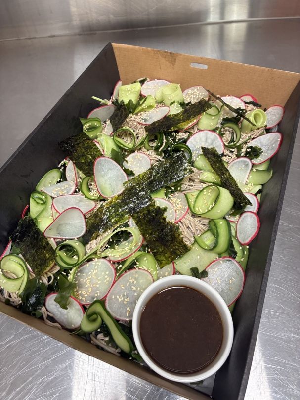 Japanese soba wakame salad, buckwheat noodles, cucumber ribbons, wakame seaweed, radish, sesame seeds, ginger soy dressing, toasted nori (V) 