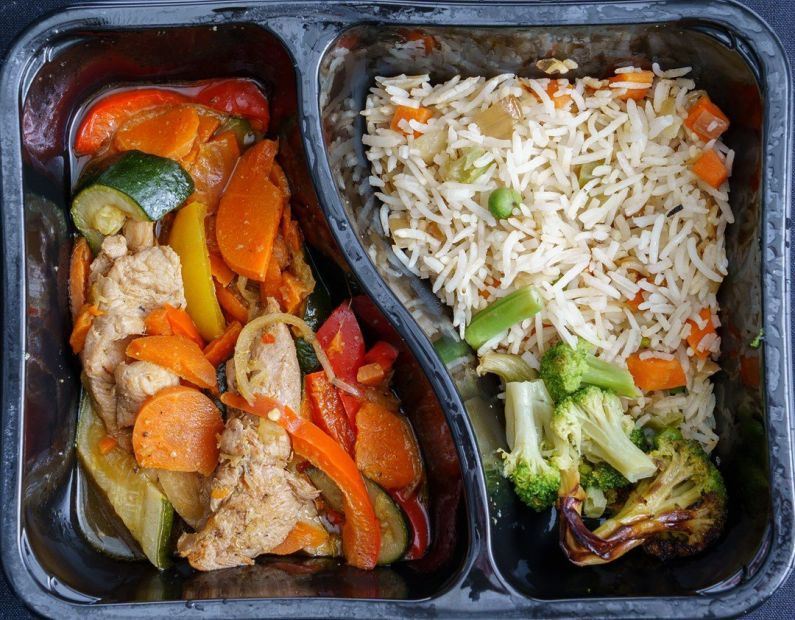 Frozen - Chicken stir fry with vegetables, rice pilaf, broccoli and cauliflower