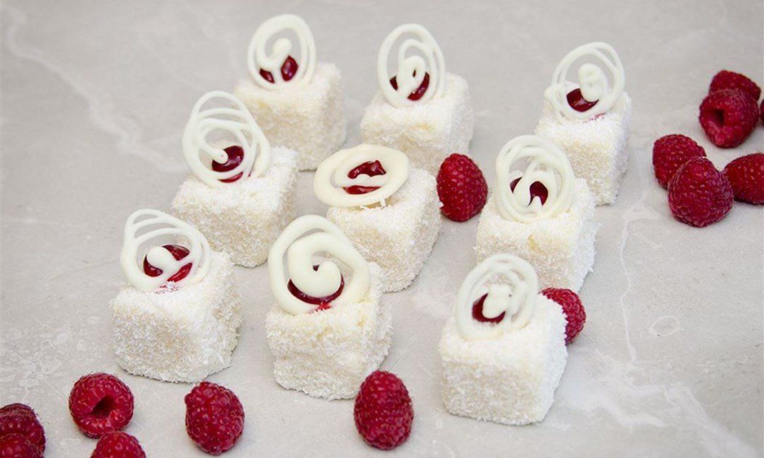 White chocolate lamington, raspberry curd