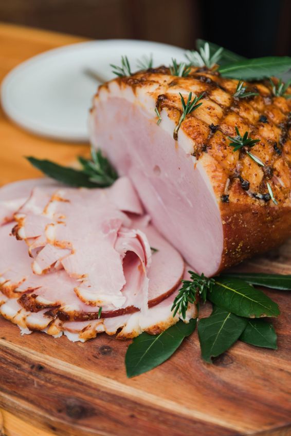 Whole ham, approx 9kg (serves about 50 guests). Alongside mustards, relish