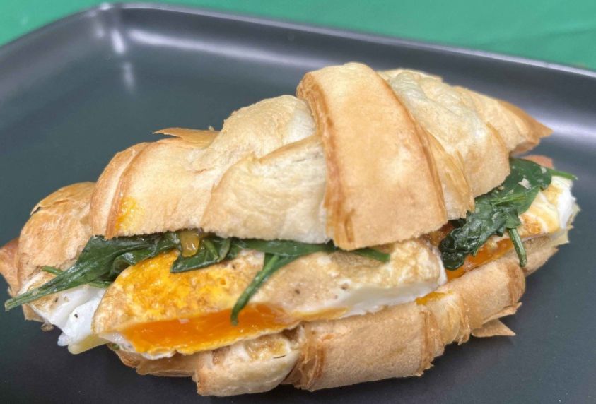 Croissant, spinach, egg, cheese, tomato chutney