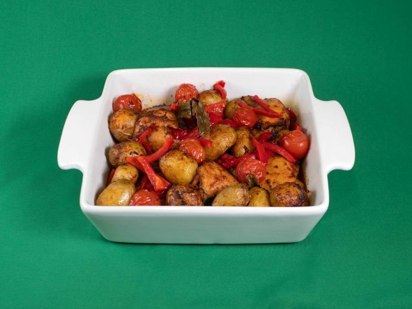Paprika chicken chicken, cherry tomatoes, and baby potatoes