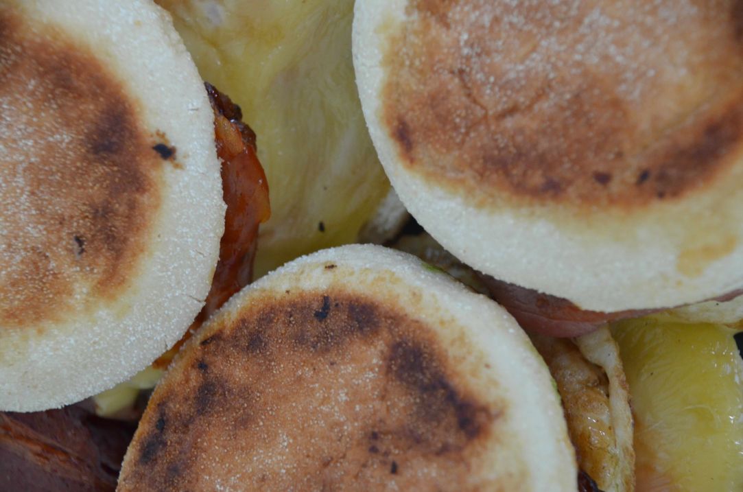 Bacon and egg brunch style English muffin, melted cheese