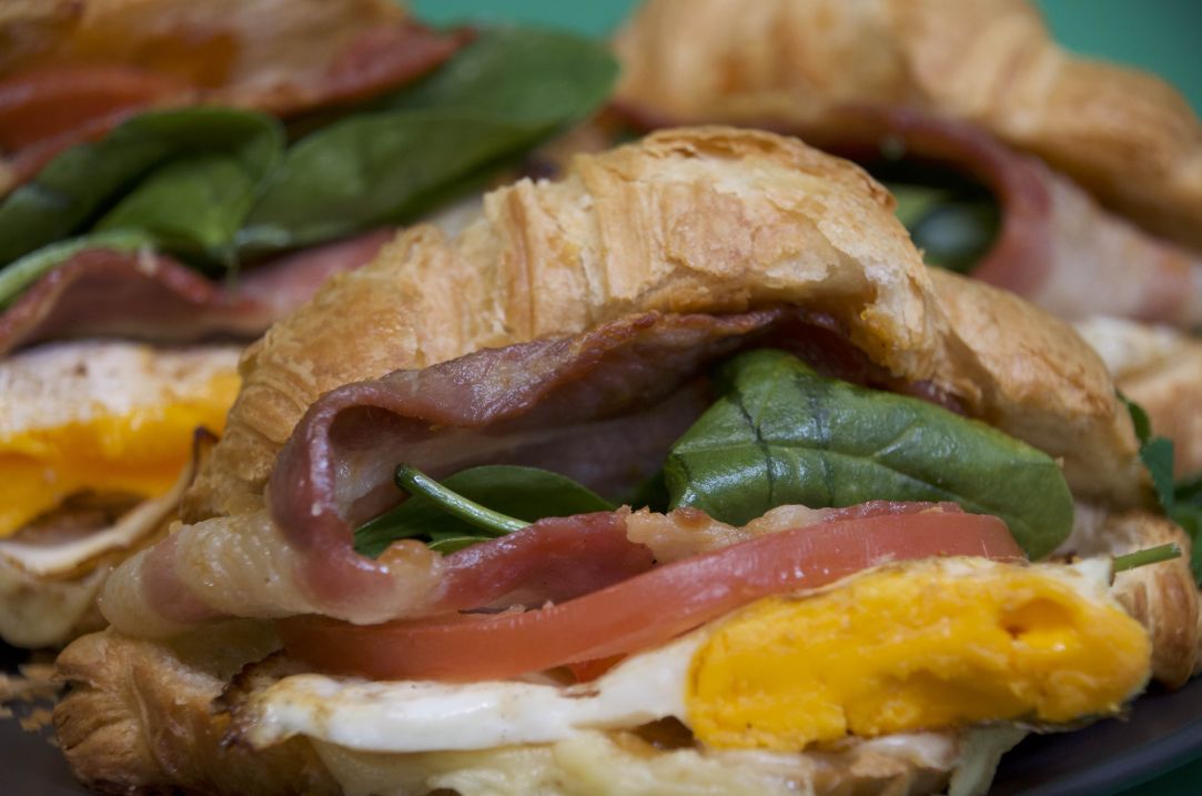 Croissant filled with bacon, egg, cheddar, tomato relish