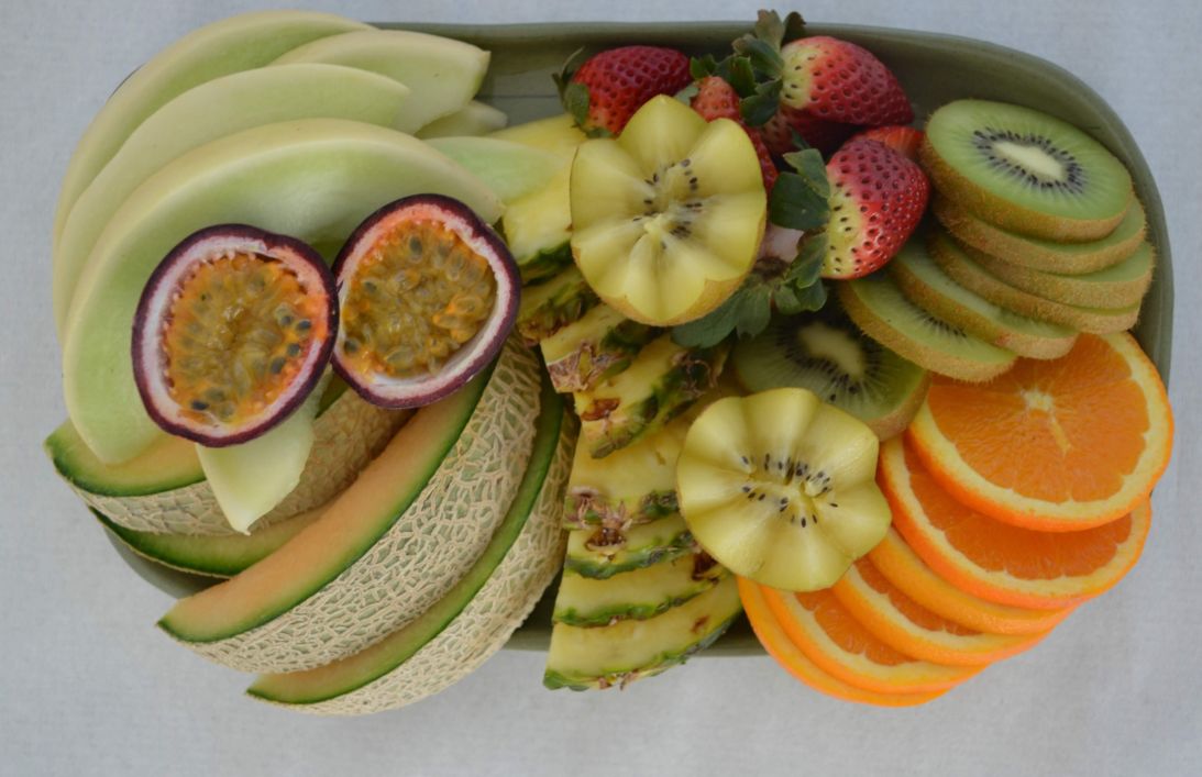 Sliced fruit and berries platter per person