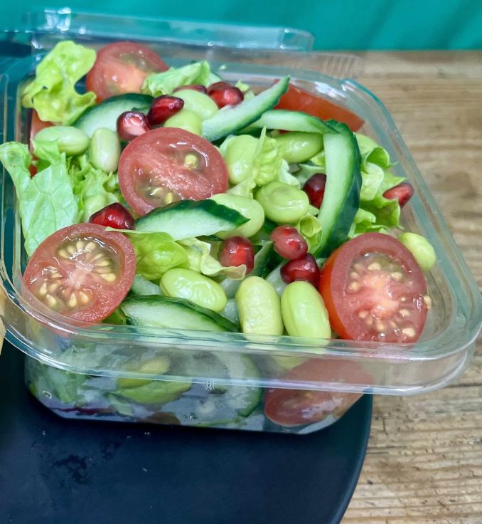 Leafy salad, edamame, cucumber, tomato, individual