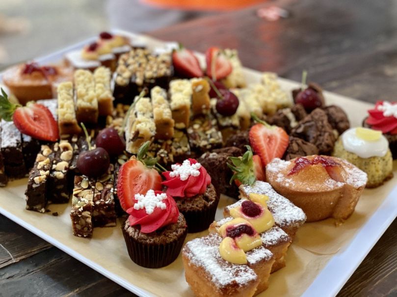 Mixed cakes & slices with fresh fruit platter