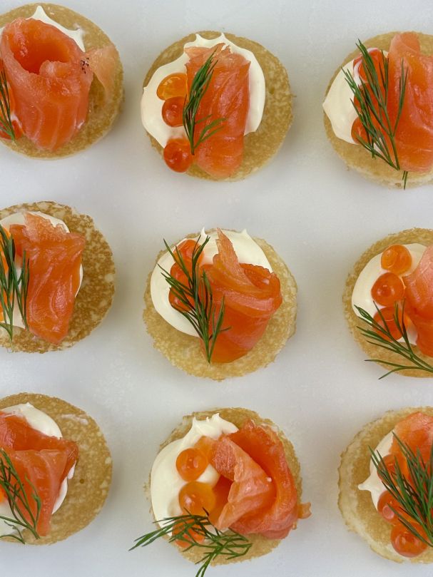Botanical gin cured salmon blini w keta caviar & crème fraiche