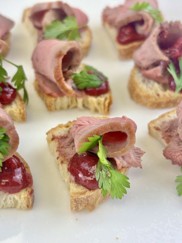 Seared duck brioche w free-range chicken liver parfait & plum