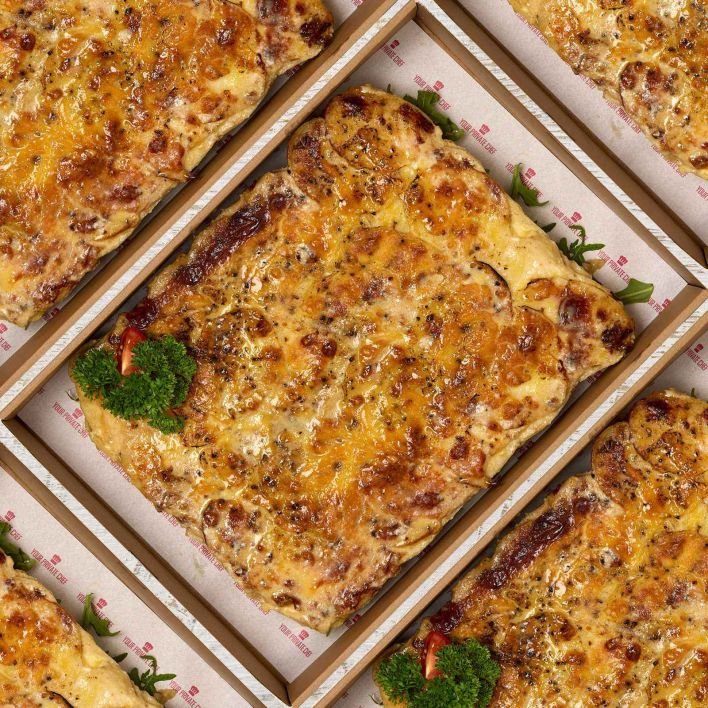 Potato Gratin - Layered Sliced potato with seasoned cream, tasty cheese & browned on top GF