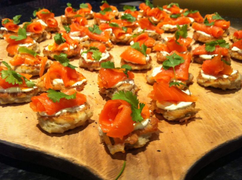 Citrus salmon avocado ceviche on corn tortilla and topped with micro herb (gf) (df)